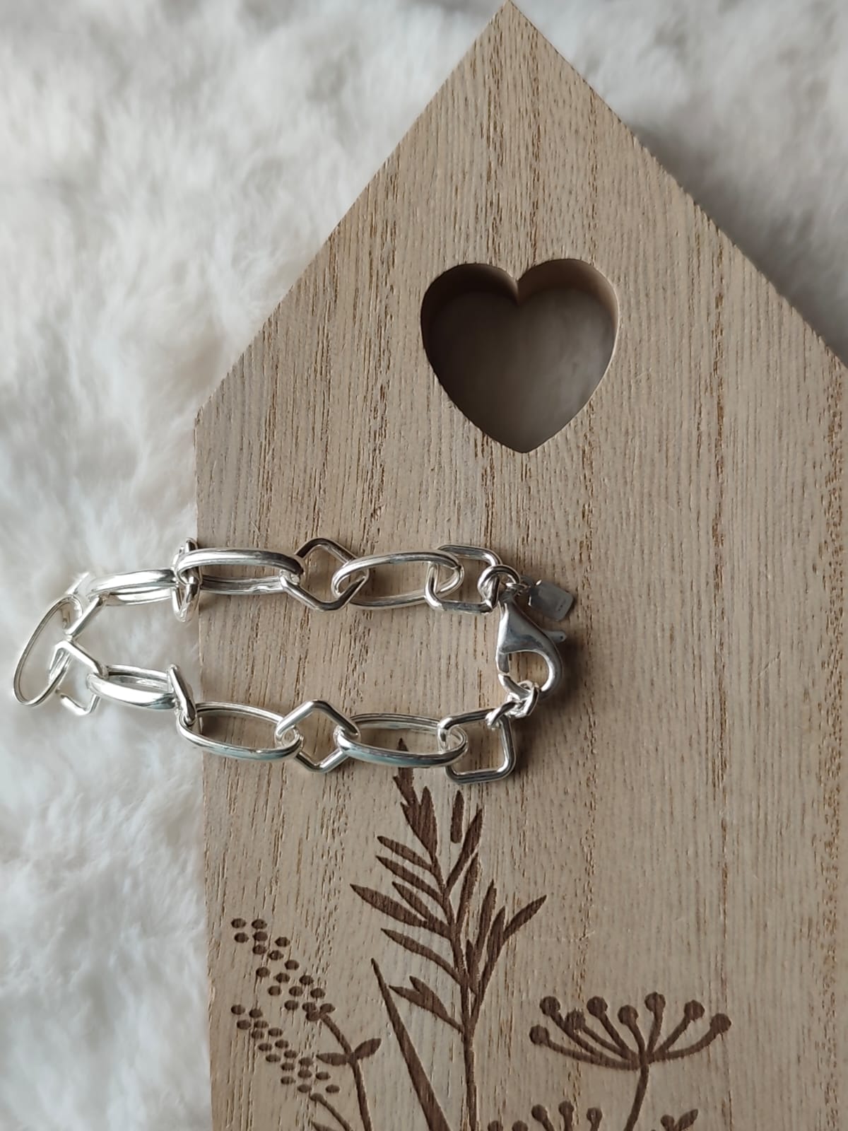 Pulsera plata ley asas huecas