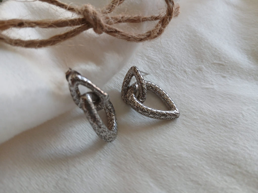 Pendiente plata 925 dos gotas enlazadas huecas labradas (Rodio)